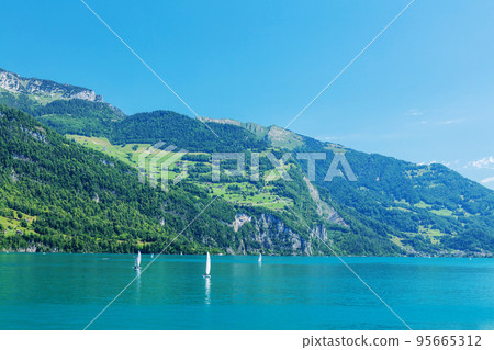 Panoramic view of lake in mountains Panoramic view of lake in mountains 95665312