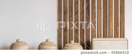 Modern Japandi appartment interior design in earth tones, natural textures with wooden solid oak furniture and sliding Japanese wood doors. Japandi concept 95666428