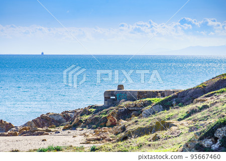 War bunker on the beach coast, Spain 95667460