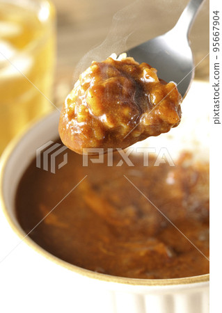 Hot cheese curry rice and tea on a heat-resistant dish Hot cheese curry rice and tea on a heat-resistant dish 95667904