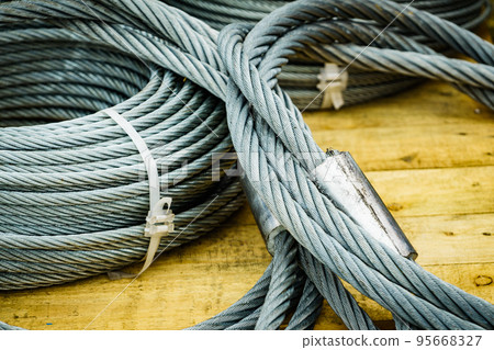 Clean new steel rope wire, coiled steel cable. Clean new steel rope wire, coiled steel cable. 95668327