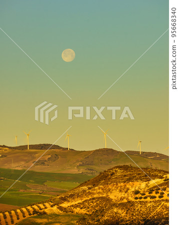 Wind turbines on hills, Andalusia Spain 95668340