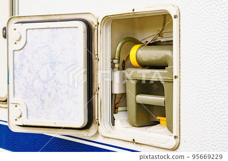 Serving caravan in dump station., tank toilet cassette 95669229