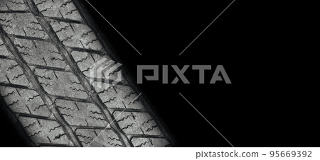 Old vehicle tire texture background , tire tread wear out Old vehicle tire texture background , tire tread wear out 95669392