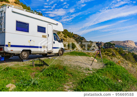 Motor home camping on coast, Spain 95669588