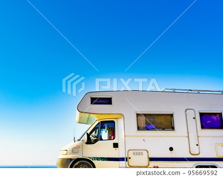 Rv caravan camping on sea shore 95669592
