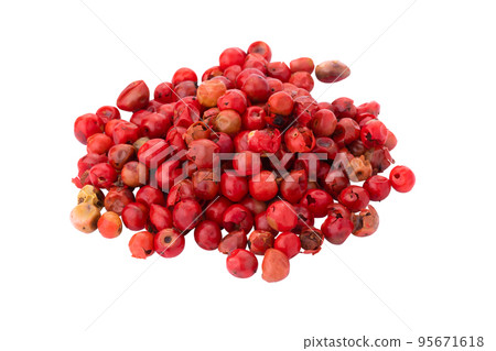 Pink peppercorns seeds isolated on white background. 95671618