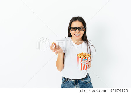 Happy smiling brunette girl in casual jeans Happy smiling brunette girl in casual jeans 95674173