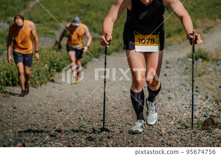 group male athletes running uphill race group male athletes running uphill race 95674756