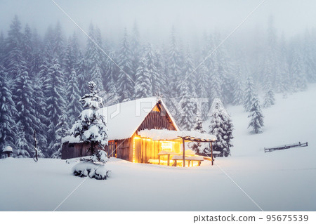 Fantastic landscape with snowy house Fantastic landscape with snowy house 95675539
