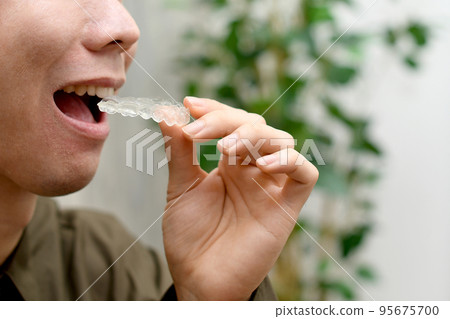 Image of a young man wearing a mouthpiece 95675700