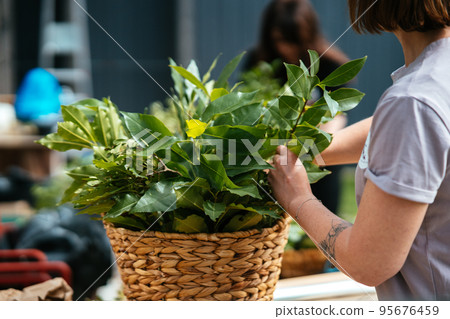 A woman is preparing decorations for a wedding. Close view A woman is preparing decorations for a wedding. Close view 95676459