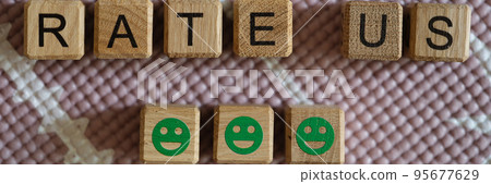 Text rate us and green positive emoticons Text rate us and green positive emoticons 95677629