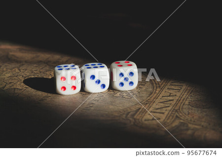 Board game and game chips of different colors on map. Board game and game chips of different colors on map. 95677674