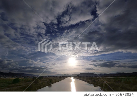 Refreshing autumn morning sky with various clouds and reflected river surface, super wide angle, mainly sky, 221011am 95678024