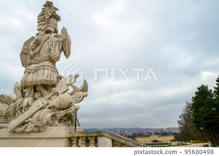 Cafe Gloriette in the arch on the hill and sculptures overlooking the city and the palace in the Schlosspark Cafe Gloriette in the arch on the hill and sculptures overlooking the city and the palace in the Schlosspark 95680498