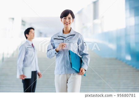 Work staff inspecting the construction site 95680781