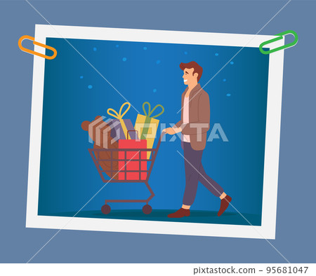 Photo of a man with gift boxes and toy bear in the shopping cart. Guy isolated on blue background Photo of a man with gift boxes and toy bear in the shopping cart. Guy isolated on blue background 95681047