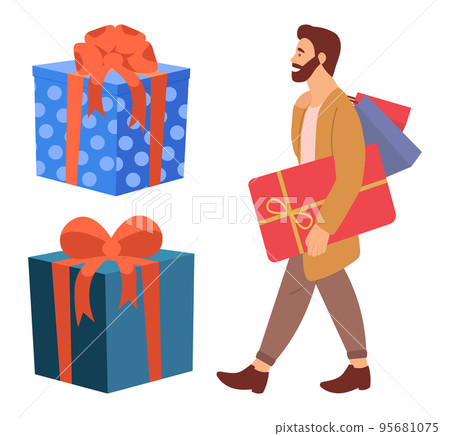 Serious bearded man is standing with presents in his hands. Young shopper guy near big gift boxes Serious bearded man is standing with presents in his hands. Young shopper guy near big gift boxes 95681075