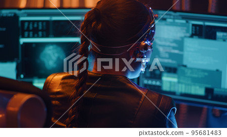 Cyberpunk girl backview types on keyboard multiple monitors with strings of code Cyberpunk girl backview types on keyboard multiple monitors with strings of code 95681483
