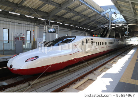 Nishikyushu Shinkansen N700S series stopping at Isahaya Station 95684967