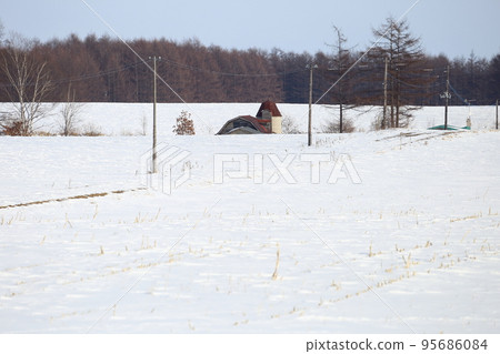 Hokkaido, Tokachi region, scenery with a ranch (winter) 95686084