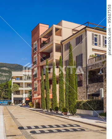 Yacht marina, beautiful Mediterranean landscape in warm colors. Montenegro, Kotor Bay, Tivat city. Porto Montenegro marina view. Go Everywhere 95687558