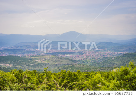 Panoramic landscape Podgorica, Montenegro. View from the top of the mountain. Panoramic Landscape Of Mountain city 95687735