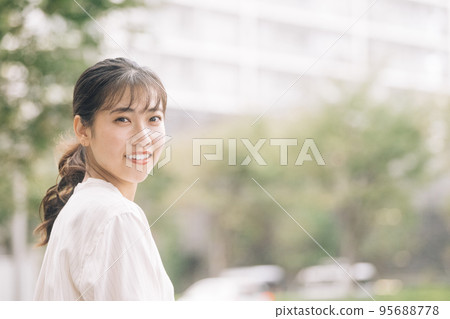 Street trees and business women 95688778