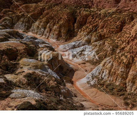 Landscape of multi-colored clay dunes. Mars on earth. Landscape of multi-colored clay dunes. Mars on earth. 95689205