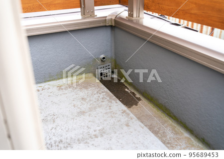Dirt on the veranda/balcony floor 95689453