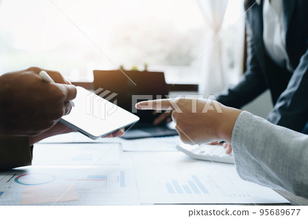 Asian entrepreneurs and business people meeting in a conference room in business planning, financial budget and investment risk assessment to analyze customer groups to increase company growth. 95689677