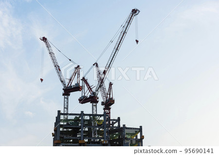View of the building construction site with cranes in Taichung, Taiwan. View of the building construction site with cranes in Taichung, Taiwan. 95690141