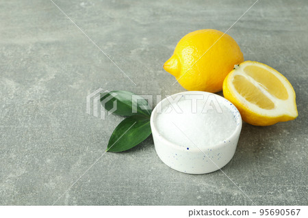 Concept of household cleaners with lemon acid Concept of household cleaners with lemon acid 95690567