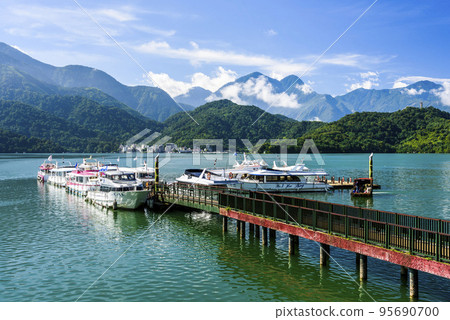 The scenery of the Yacht Marina at Sun Moon Lake in the morning is a famous attraction in Nantou, Taiwan. 95690700
