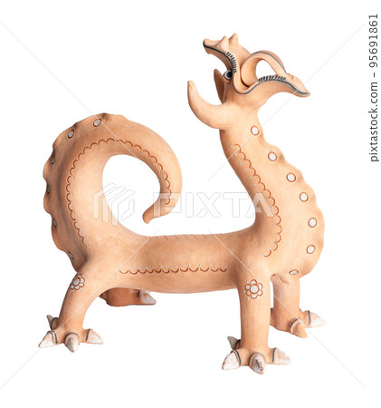 A dragon, clay oriental souvenir on a white background A dragon, clay oriental souvenir on a white background 95691861