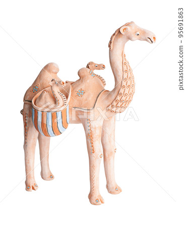 A camel, clay oriental souvenir on a white background 95691863