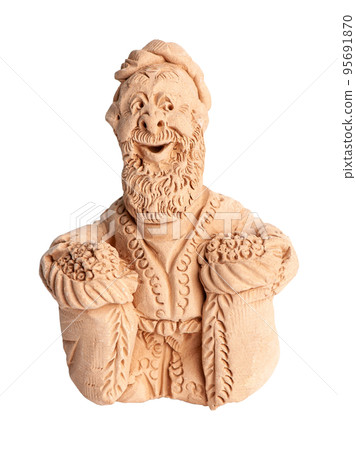 A grand father, clay oriental souvenir on a white background 95691870