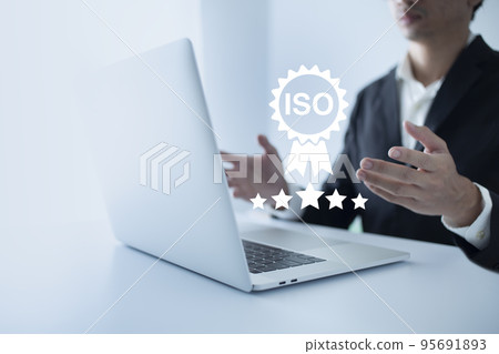 Businessman showing sign of leading service, quality assurance, warranty, standardization, ISO certification and standardization concept. 95691893