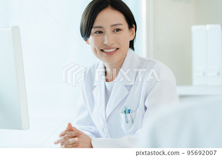 Healthcare workers facing patients 95692007