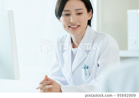 Healthcare workers facing patients 95692009