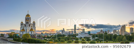 Temple in autumn in beautiful orange sunset light. Temple on Blood, Yekaterinburg, Russia Temple in autumn in beautiful orange sunset light. Temple on Blood, Yekaterinburg, Russia 95692679