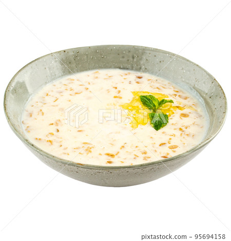 Bowl of milk porridge breakfast 95694158