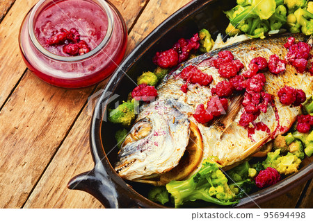 Prepared roasted fish dorado 95694498