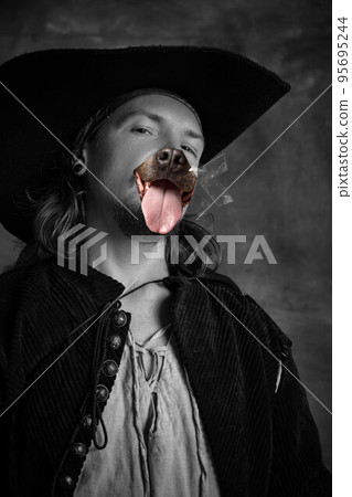 Creative art collage. Portrait of brutal man, medieval pirate in hat with dog's muzzle. Black and white photo Creative art collage. Portrait of brutal man, medieval pirate in hat with dog's muzzle. Black and white photo 95695244