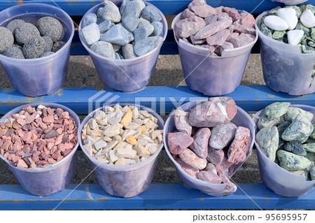 Construction Materials. Natural stones are sold in construction market. Building materials for decoration and construction. 95695957