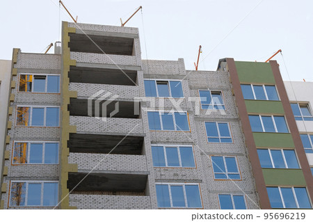 Building and Construction site of new home. House under construction. House under construction at building site. 95696219