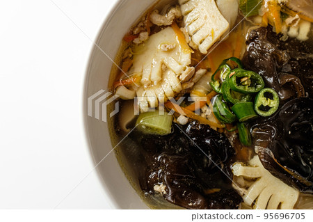 white champon soup on white background 95696705
