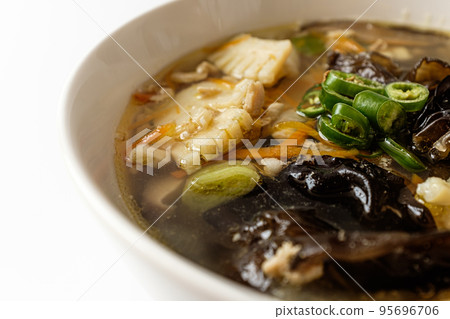 white champon soup on white background 95696706