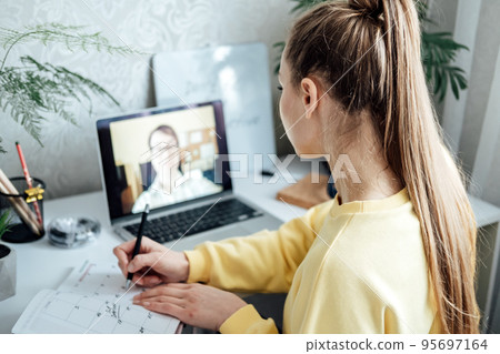 Young woman business woman student teacher tutor having online virtual video call. Freelancer having video conference calling on laptop computer talk by webcam learn teach in online chat 95697164